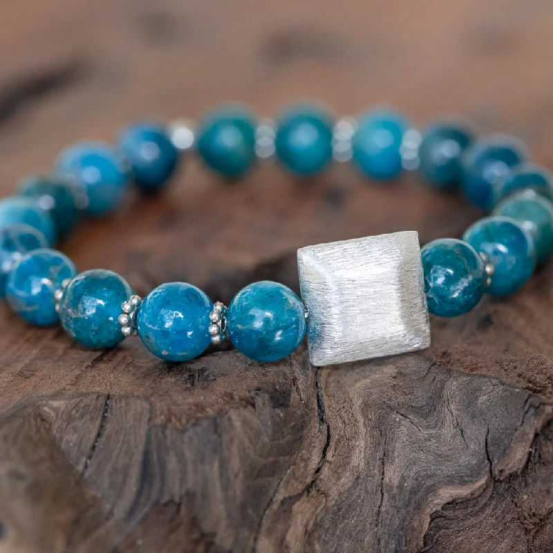 adjustable stone bracelet-You Light Up the World: Blue Apatite and Brushed Silver Bead Stretch Bracelet